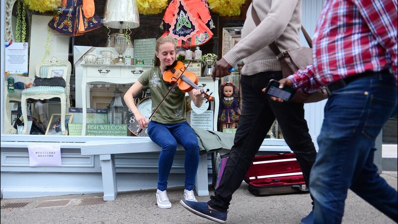 Seoda Matthews from Drogheda playing on the street during Fleadh Cheoil Na hEireann in Drogheda in 2018. The Fleadh returns to the Co Louth town this year.  Photograph: Bryan O’Brien/The Irish Times