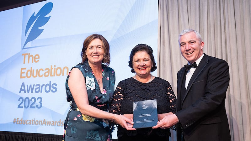 Celestine Rowland, awards judge, presents the Best International Collaboration Project award to Colin Cooney and Maeve McArdle, Dundalk Institute of Technology 