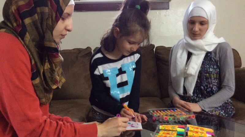 Cousins Lujain Breijawi (left) and Alaa Breijawi, with Alaa’s four-year-old daughter Hind, who arrived recently in Michigan, having lived in Jordan since fleeing the Syrian war in 2012. Photograph: Simon Carswell