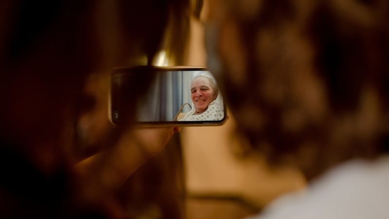 Larry Kelly while at the New Jewish Home, FaceTimes with Dawn, his wife, and Jackie, his daughter at their home in Manhattan on July 14th. Photograph: Heather Sten/The New York Times