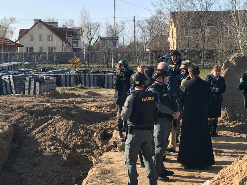 Minister for Foreign Affairs Simon Coveney has visited the site of a mass grave where more than 50 bodies were found in Bucha, Ukraine.