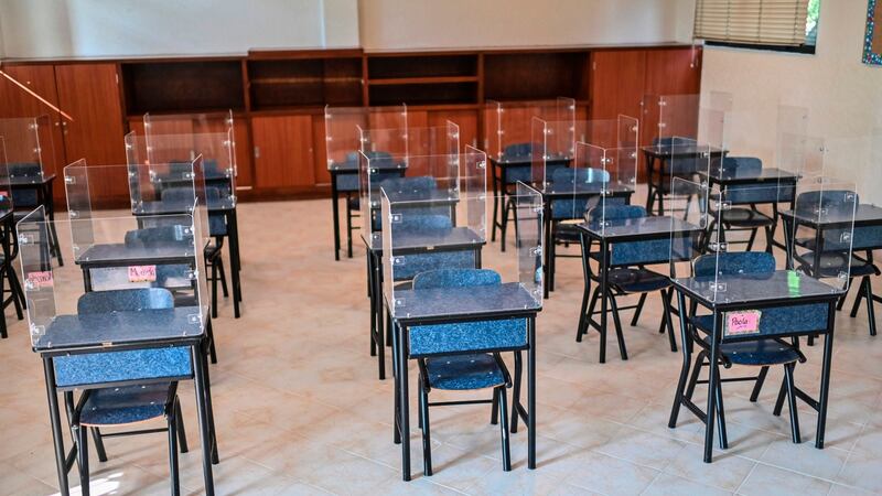 Picture of desks with acrylic shields put as a preventive measure against the spread of Covid-19 at a Motolinia school classroom in Mexico City. Photograph: Pedro PARDO/AFP/Getty Images