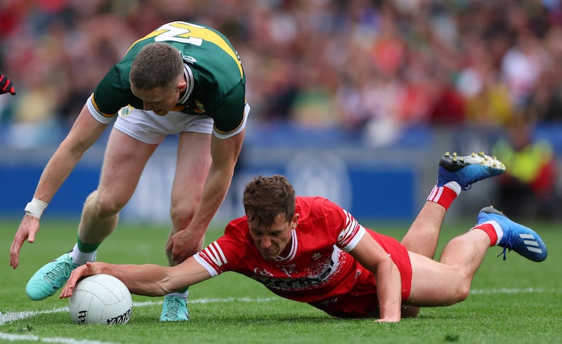 Derry's Shane McGuigan in action against Kerry. The quarter-finals in Croke Park failed cumulatively to break the 100,000 spectator barrier for the first time in 24 years. Photograph: James Crombie/Inpho