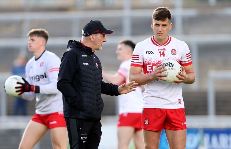 Derry manager Mickey Harte and Shane McGuigan. Photograph:  INPHO/Bryan Keane