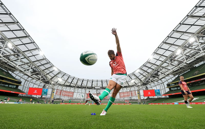 Ross Byrne gets in some kicking practice during Ireland's captain's run at the Aviva Stadium. Photograph: Dan Sheridan/Inpho 