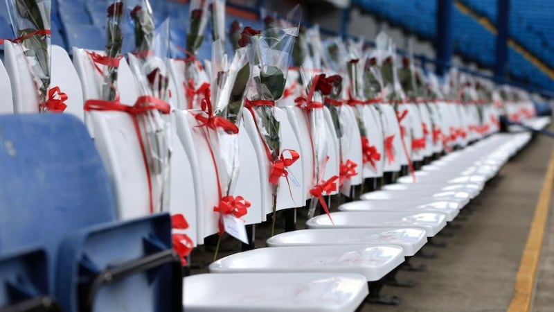 96 blue seats at the Leppings Lane end of Hillsborough are replaced by 96 white seats to represent the 96 Liverpool fans who died at the Hillsborough disaster. Photograph: PA Wire.