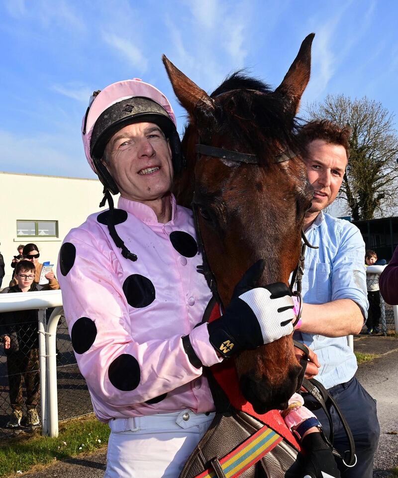 Simon Condon with his horse Eat The Book after their win in the Kilbeggan handicap Hurdle. Photograph: Healy Racing