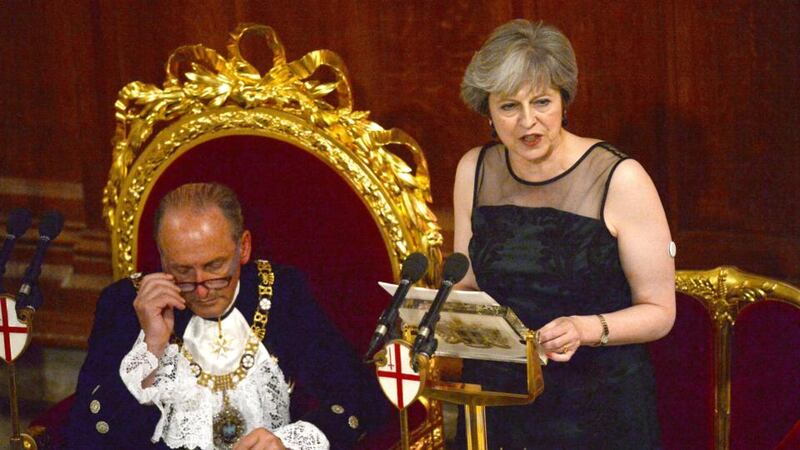 “I have a very simple message for Russia. We know what you are doing. And you will not succeed”: Theresa May makes her speech at the lord mayor’s banquet in London. Photograph: Victoria Jones/PA Wire