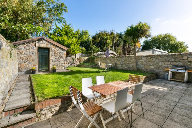 The property has an insulated granite shed in the rear garden