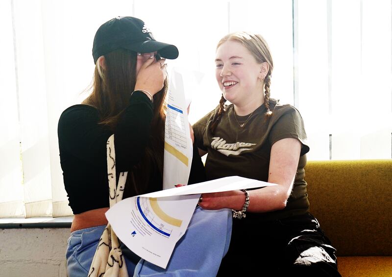 Megan Gray (left) and Rebecca McDermott, react after collecting their Leaving Certificate results at Donahies Community School, Dublin. Photograph: Brian Lawless/PA Wire