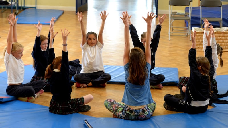 Laura Dowdall taking third class through   their creative wellbeing class. Photograph: Cyril Byrne