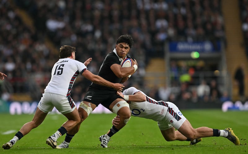 New Zealand flanker Wallace Sititi is tackled during the Test match against England at Twickenham last Saturday. Photograph: Glyn Kirk/AFP/Getty Images