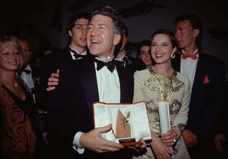 David Lynch with then partner Isabella Rossellini after winning the Palme d'Or at Cannes in 1990. Photograph: Eric Robert/Sygma/Sygma via Getty Images