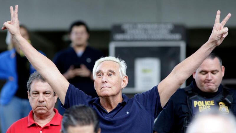 Roger Stone, on leaving the courthouse in Fort Lauderdale, Florida, gestures as Nixon once did.  AP Photo/Lynne Sladky