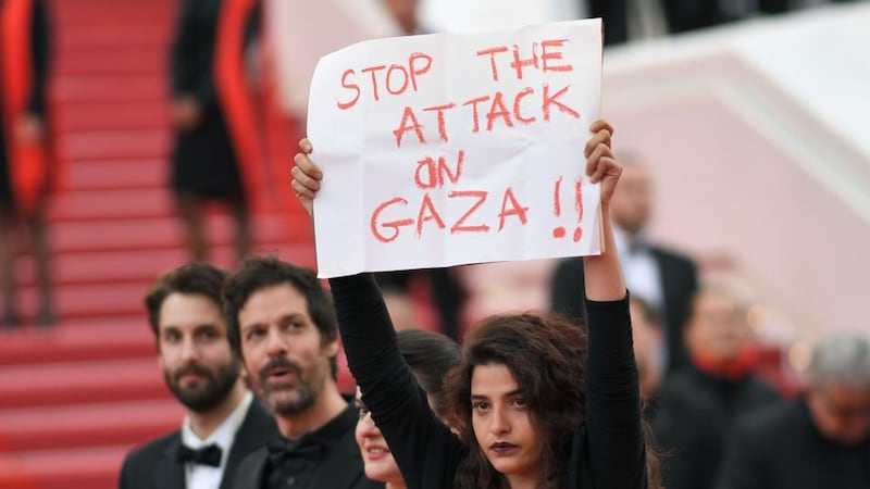 Solo: A Star Wars Story: Manal Issa protests against Israel’s attack on Gaza at the film’s Cannes premiere. Photograph: Loic Venance/AFP/Getty