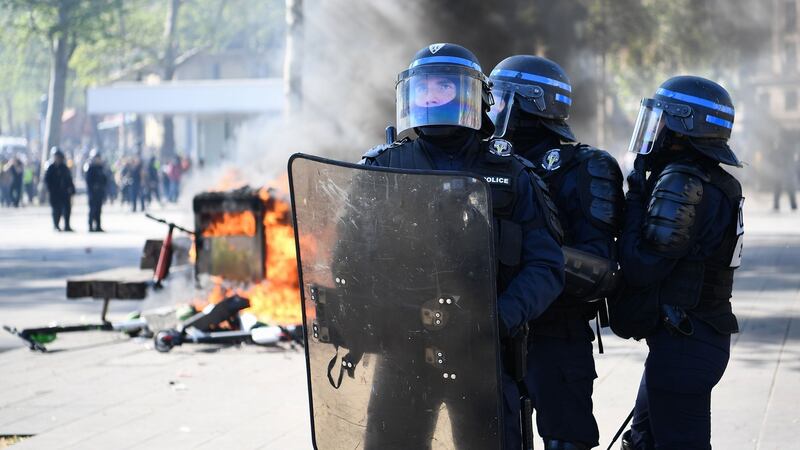 Anti-riot police hold a position during clashes in Paris, as thousands of yellow-vest protesters took to the streets in the 23rd week of anti-government marches. Photograph: Anne-Christine Poujoulat/AFP/Getty Images