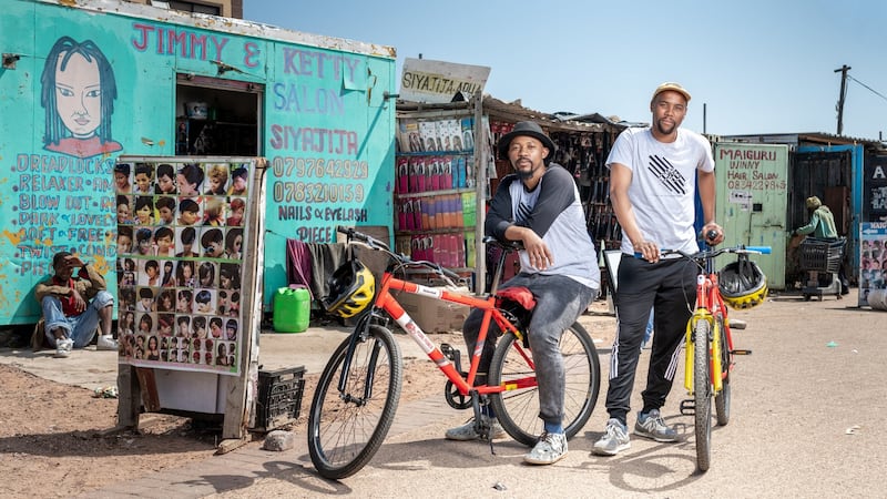 Ayanda Cuba and Buntu Matole, who have a bike tour business in Khayelitsha township near Cape Town. Photograph: Thom Pierce