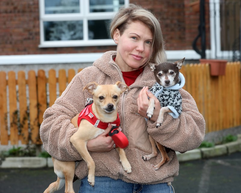 Ukrainian refugee Iryna Grynchuk with her pet dogs. Photograph: Brendan Gleeson