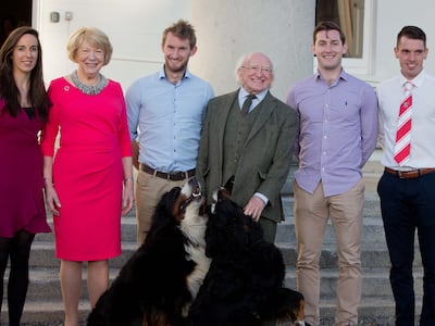 Michael D Higgins, his wife Sabina and their dogs Bród and Síoda meet members of Skibbereen Rowing Club in 2017. Photograph: Tom Honan.