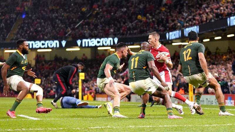 Liam Williams had to jump over a fan while running with the ball. Photo: David Davies/PA Wire