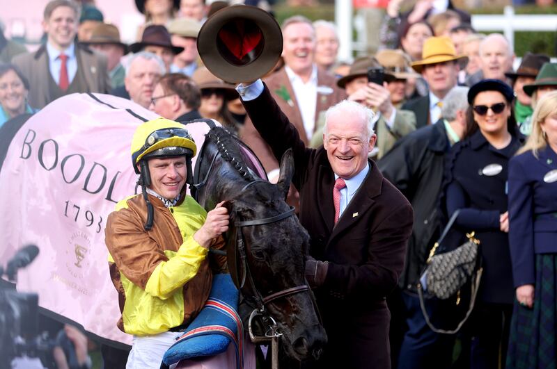 Jockey Paul Townend (left) and trainer Willie Mullins celebrate with Galopin Des Champs after winning the Cheltenham Gold Cup in 2023. Photograph: Steve Paston/The Jockey Club/PA