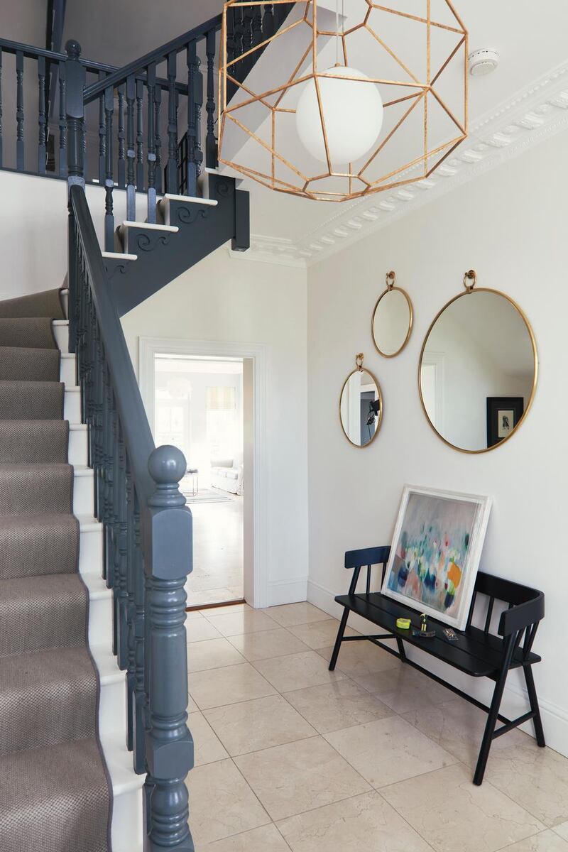 Hallway stairs,marble flooring,lighting fixture,side bench,wall mirrors Photograph by Philip Lauterbach