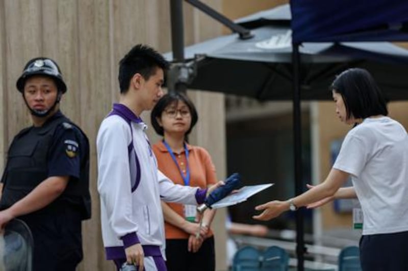 A student lines up to enter a school for China's annual national college entrance examination in Beijing, China. The Gaokao runs from June 7-10 with 13.42 million students across the country participating. Photograph: Wu Hao/EPA-EFE