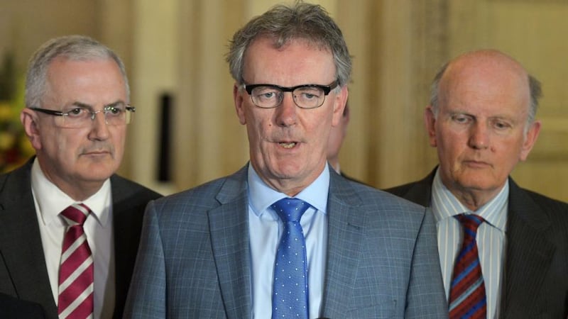 UUP leader Mike Nesbitt (2nd left) answers questions during a press conference at Stormont. Photograph:  Charles McQuillan/Getty Images