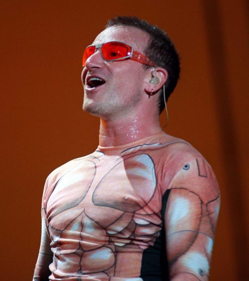 Bono on stage during the PopMart tour. Photograph: Terry Thorp