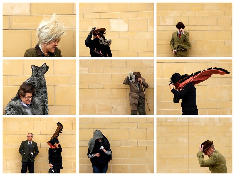 A view of wind-swept racegoers at the Cheltenham Festival