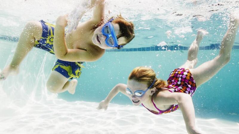 Most children enjoy a good splash in the pool when on holiday. Photograph: Getty