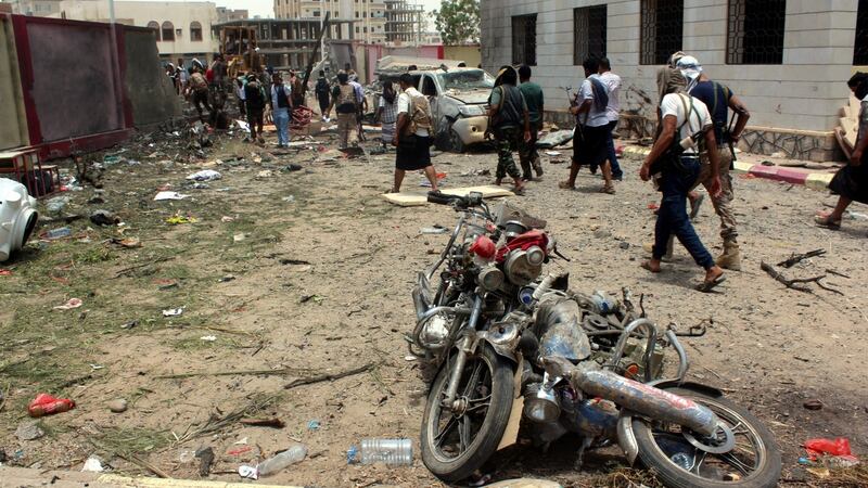 Wreckage on the site of a suicide bombing targeting a recruitment center in the southern port city of Aden.  Photograph: EPA/STR