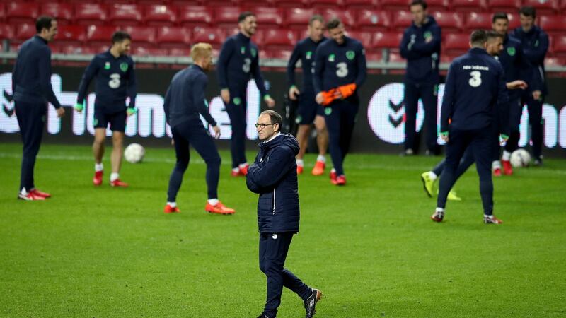 Republic Of Ireland manager Martin O’Neill watches his squad training at Parken stadium in Copenhagen. Photograph: Ryan Byrne/Inpho