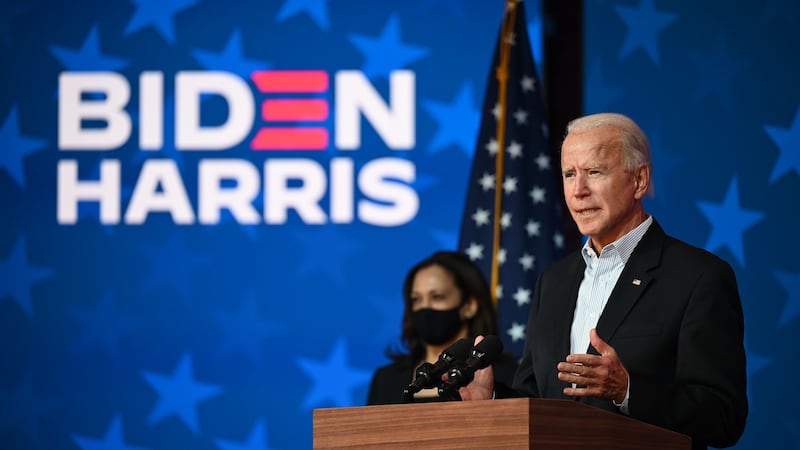 Democratic presidential candidate Joe Biden speaks as US senator and vice-presidential candidate Kamala Harris looks on at the Queen venue in Wilmington, Delaware on November 5th. Photograph: Jim Watson/AFP via Getty