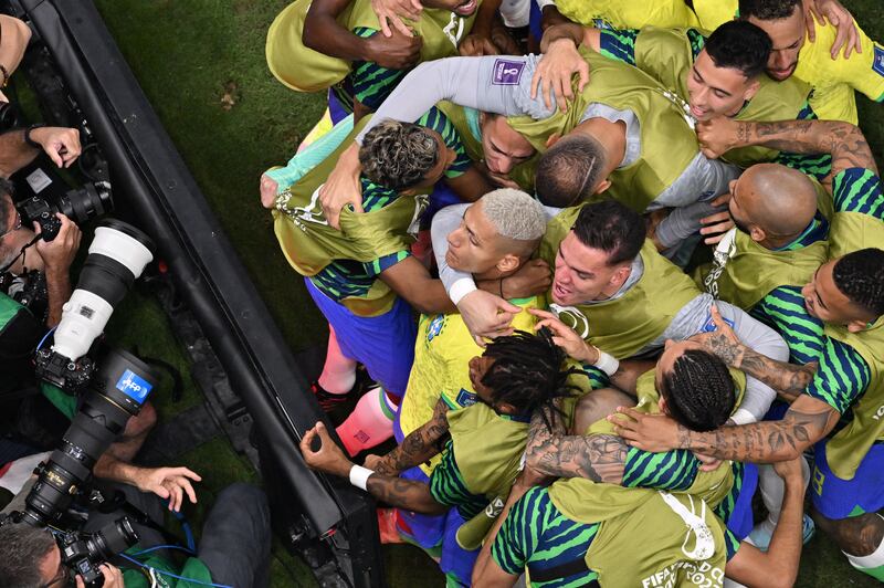 Richarlison is mobbed by his Brazilian team-mates after scoring against Serbia in the World Cup Group G  match at the Lusail Stadium. Photograph: by François-Xavier Marit/AFP via Getty Images