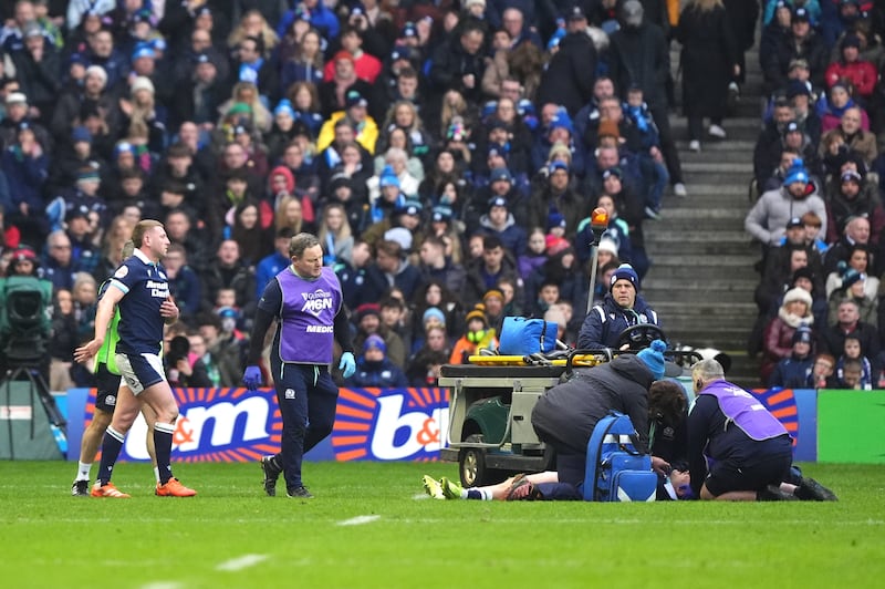 Scotland's Finn Russell (left) and Darcy Graham were forced to leave the action following a clash of heads during the opening half at Murrayfield. Photograph: Andrew Milligan/PA