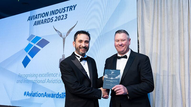 Rick Livingstone, awards judge, presents the apprenticeship programme award to John Mulqueen, International Aerospace Coatings