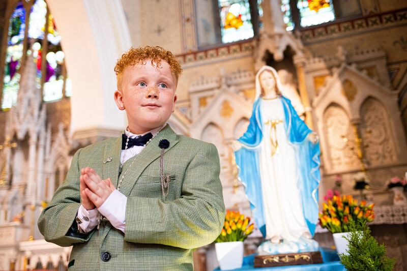 First ⁤Communion: Niall,Niall at his  First Communion. Photograph:⁢ Andrew Johnston/Walk On Air Films/BBC