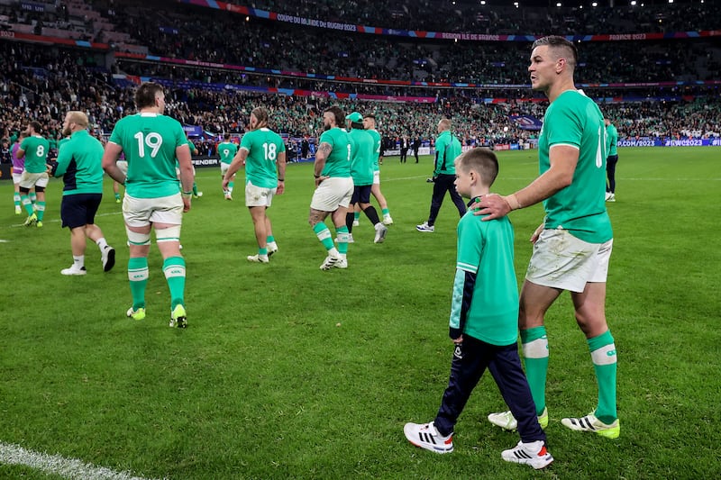 Ireland's Jonathan Sexton and his son Luca following the deeply disappointing defeat to New Zealand in the World Cup quarter-final at Stade de France in Paris. Photograph: Dan Sheridan/Inpho 