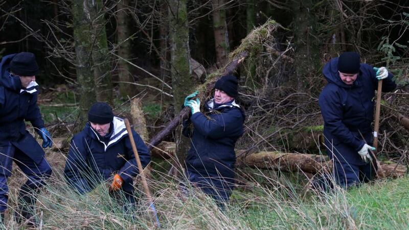 Gardaí search an area of woodland yesterday, off the Green Road in the townsland of Rosenallis, Co. Laois near Mountmellick during a renewed search for the remains of Fiona Pender who disappeared 18 years ago. Photograph: Colin Keegan, Collins Dublin.