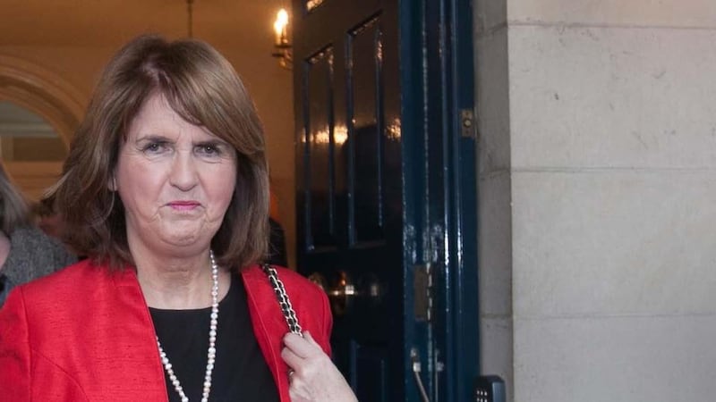 Joan Burton: gardaí had to  protect the Tánaiste  from anti-water charge demonstrators in Jobstown yesterday. Photograph: Gareth Chaney Collins