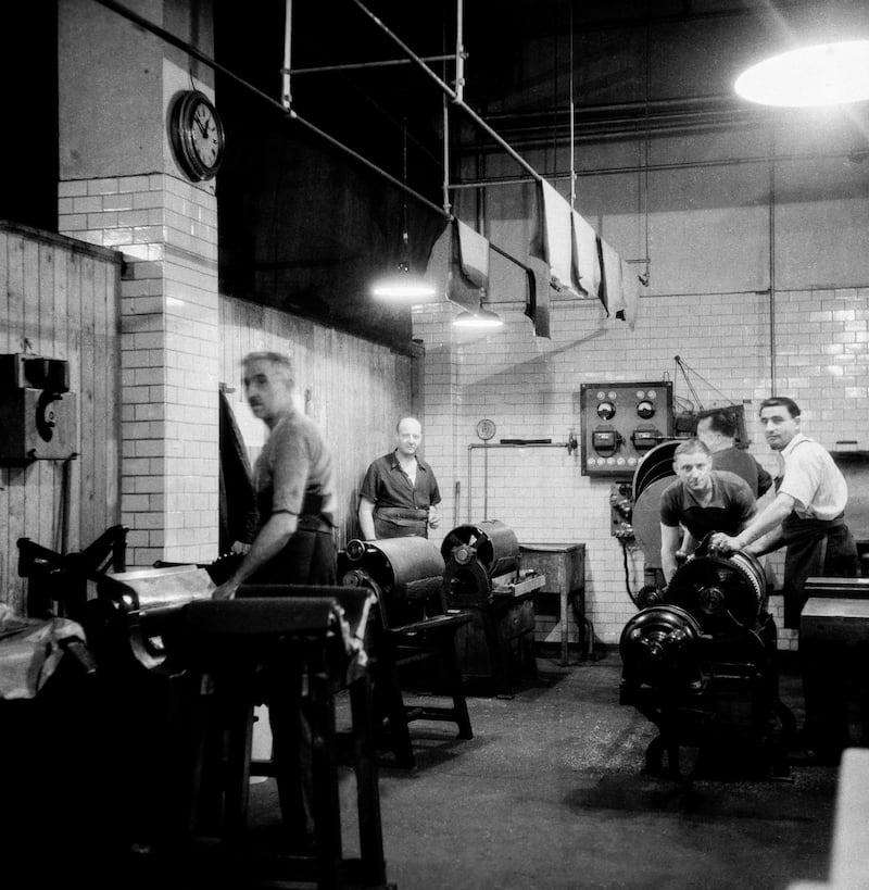 Workers in the printroom on Rue de Berri, just off Champs-Elysees in Paris. Photograph: Keystone-France/Gamma-Rapho via Getty Images