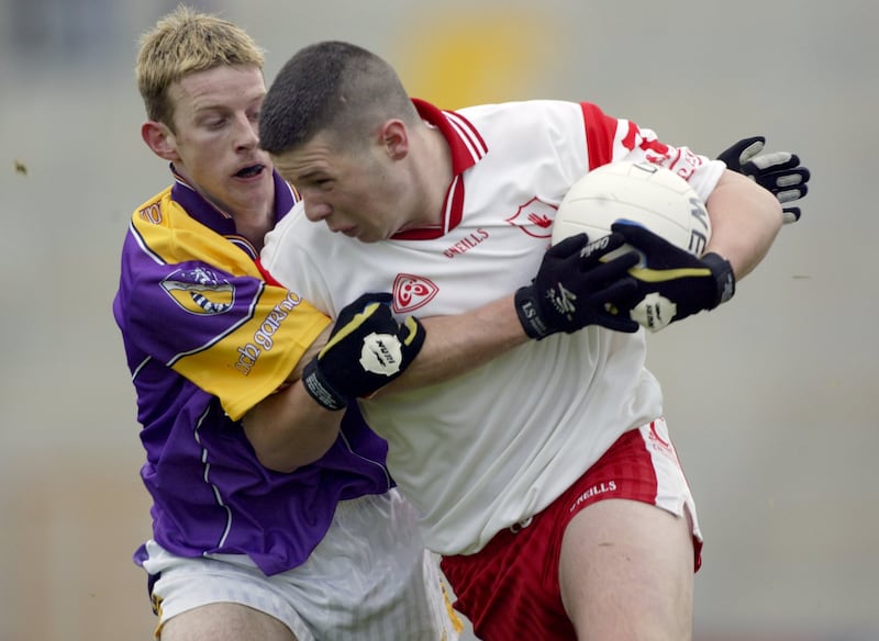 Seán Cavanagh in action for Tyrone against Niall Murphy of Wexford during the 2002 All-Ireland round one qualifier at Wexford Park. Photograph: Patrick Bolger/Inpho