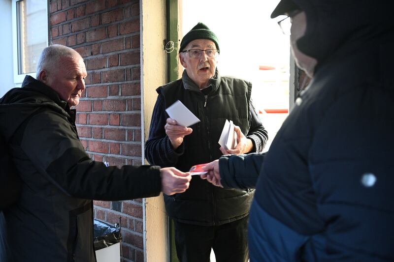 Alan Bailey (centre) has been involved with the Capuchin Centre for 50 years but said this year, demand is at record levels, with 3,000 people being given vouchers. Photograph: Bryan Meade