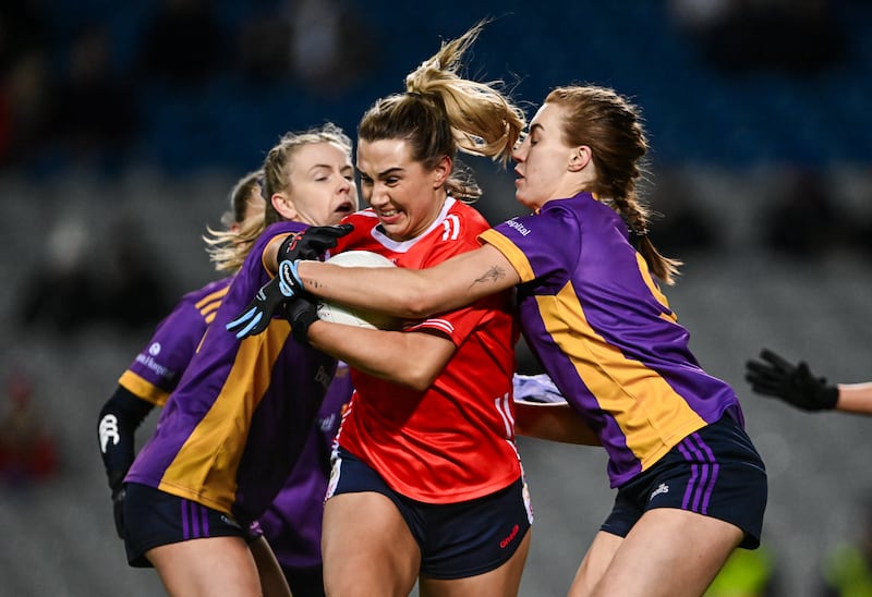 Ailish Morrissey of Kilkerrin-Clonberne is challenged by Kilmacud Crokes' Niamh Carr (left) and Lauren Magee during the AIB LGFA All-Ireland Senior Club Championship final at Croke Park. Photograph: Piaras Ó Mídheach/Sportsfile
