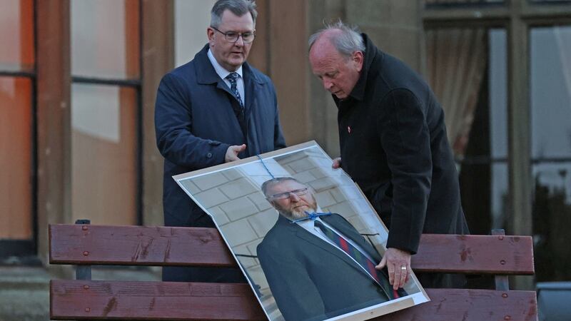 Jim Allister and DUP leader Jeffrey Donaldson remove a poster of UUP leader Doug Beattie with a noose around the neck. Photograph: Liam McBurney/PA Wire