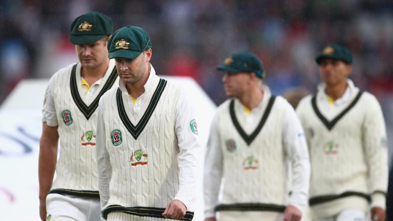 Michael Clarke and Shane Watson of Australia leave the ground after rain stopped play during day five of the 3rd Investec Ashes Test match between England and Australia at Emirates Old Trafford Cricket Ground. Photograph:  Ryan Pierse/Getty Images