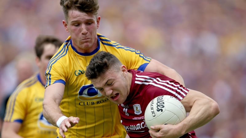 Roscommon’s Sean Mullooly with Damien Comer in the Connacht final replay. Photograph: Tommy Dickson/Inpho