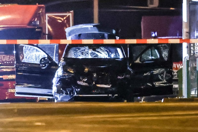 A damaged car at the scene after a car was driven into a crowd at the Christmas market in Magdeburg, Germany. Photograph: Filip Singer/EPA-EFE