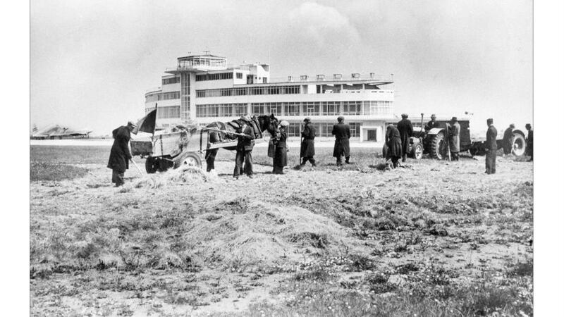 Saving the hay   near the  Dublin Airport viewing area, about  1945